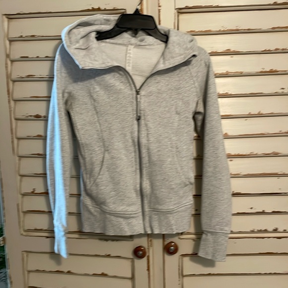 Lululemon full zip scuba sweatshirt.

Heather light gray 
Size 4 - Picture 1 of 5